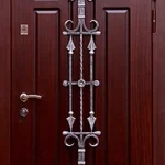 product-metallicheskaia-dver-s-kovkoi-no18-682724ef12e7.webp